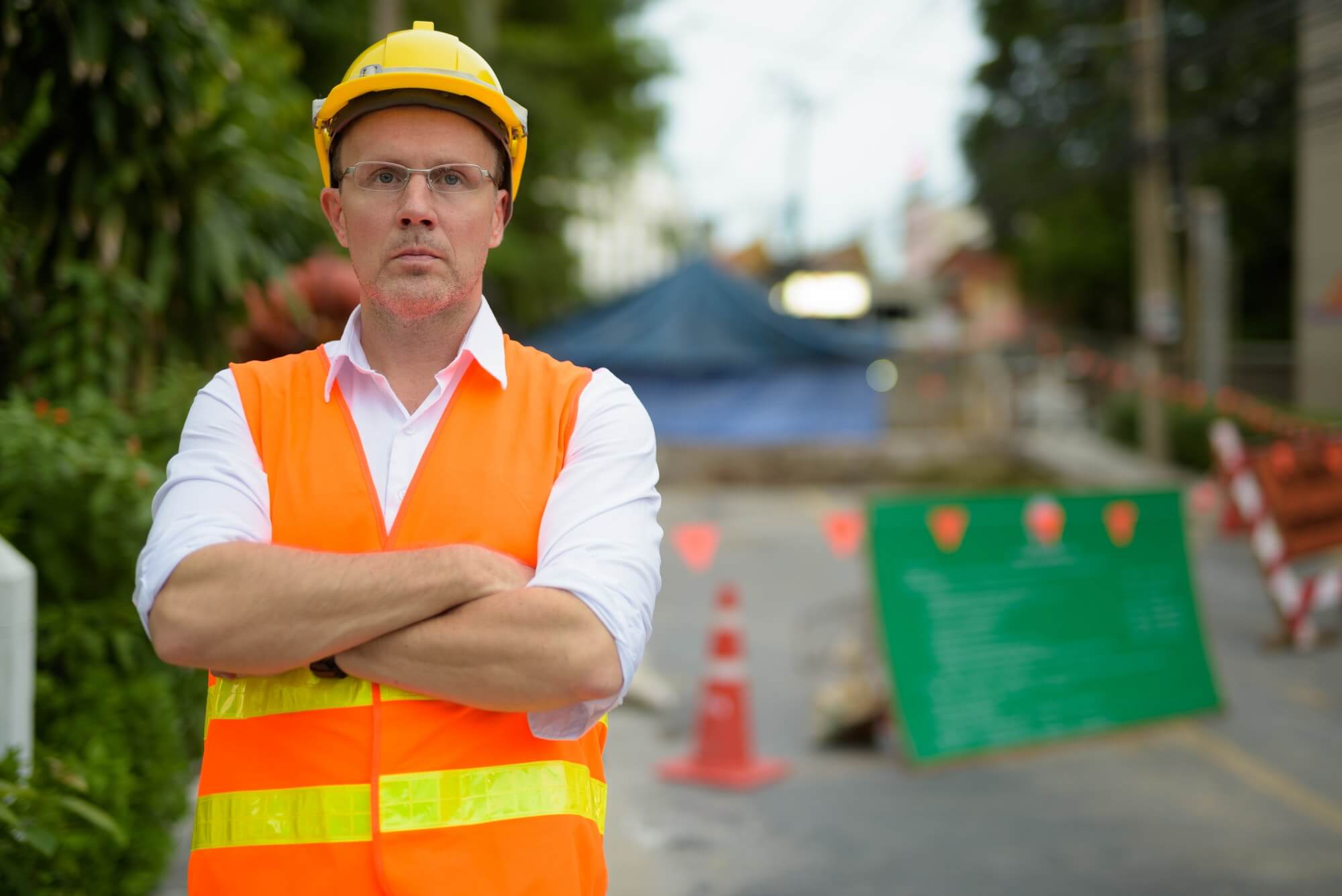 mature-man-construction-worker-at-the-construction-site-in-the-c-2.jpg